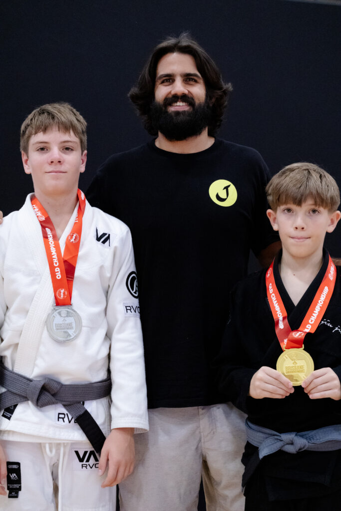 photo at the competition with head coach diego from journey jiu jitsu