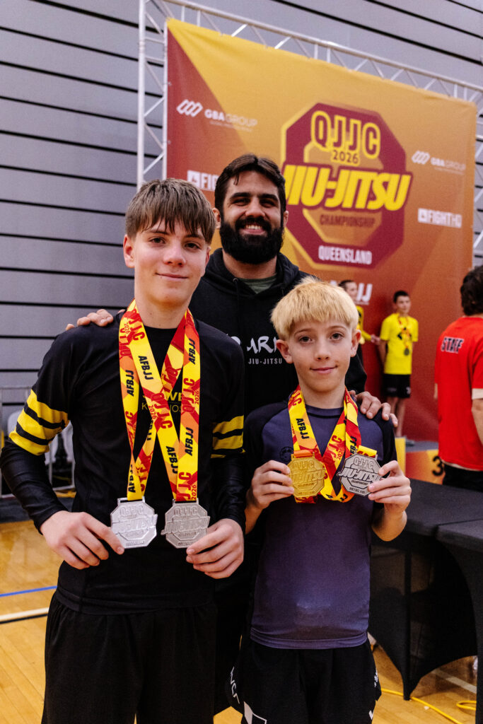 photo at the competition with head coach diego from journey jiu jitsu